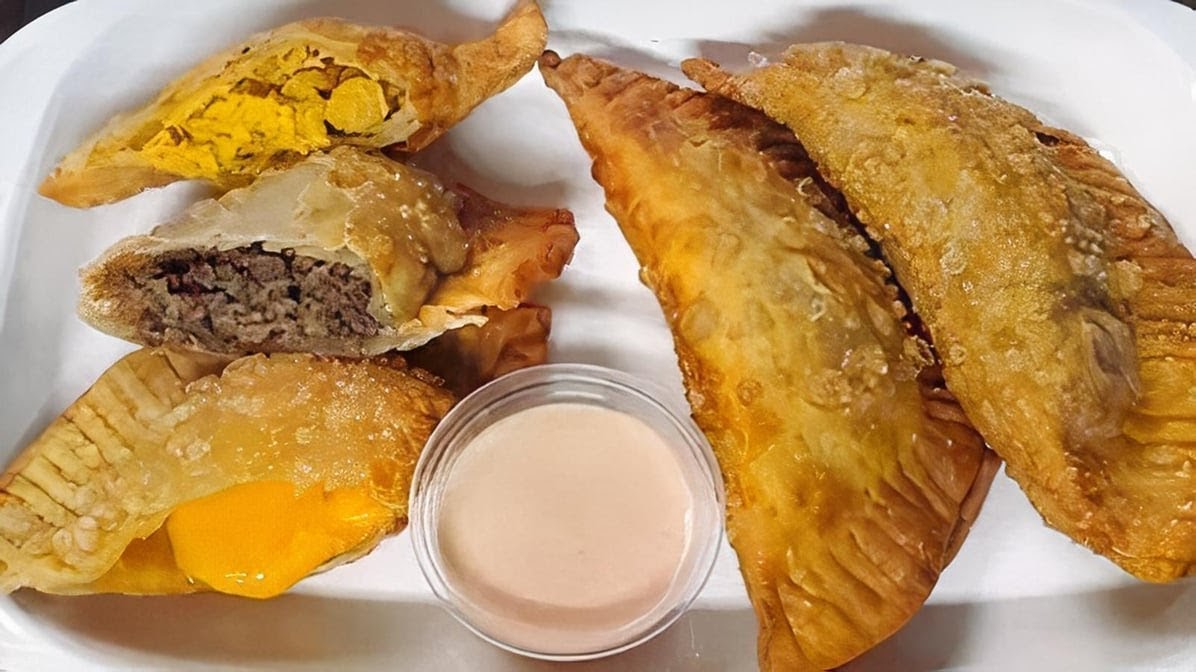 Dominican meat platter with sides